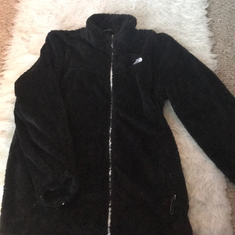 black fuzzy north face jacket